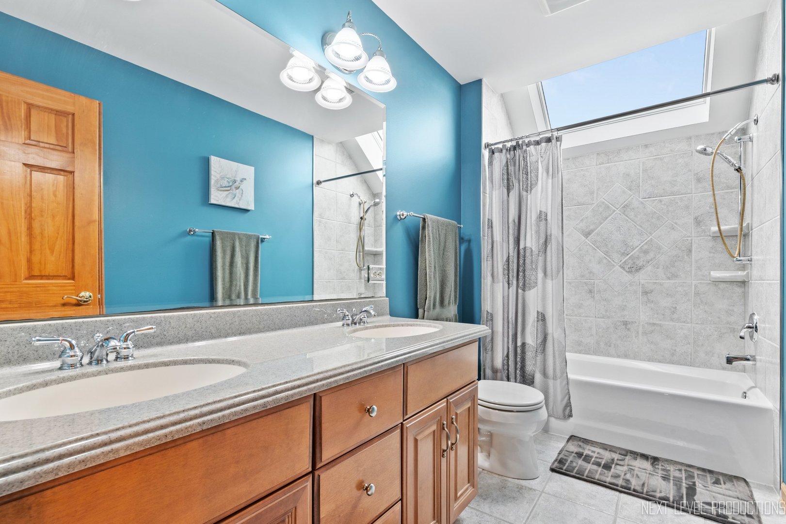 5370 Old Reserve Road Oswego, IL 60543 - Photo 37 of 48 a spacious bathroom with a granite countertop sink toilet a large mirror a shower and a bathtub