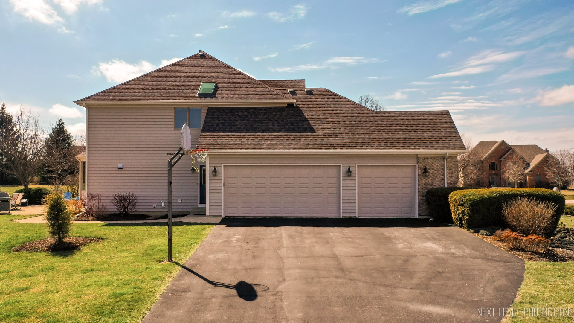 5370 Old Reserve Road Oswego, IL 60543 - Photo 4 of 48 a front view of a house with a yard and garage