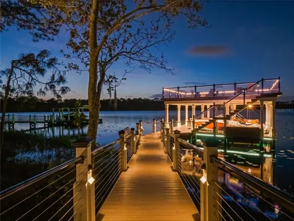 a view of a balcony with chairs