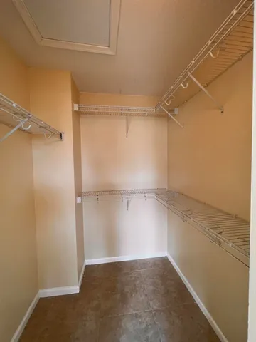a view of an empty walk in closet