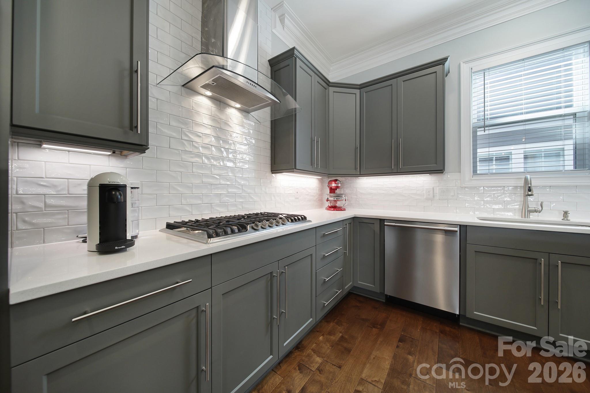 1633 Half Pint Loop Fort Mill, SC 29708 - Photo 13 of 48 a kitchen with stainless steel appliances granite countertop a sink dishwasher a stove and a microwave oven