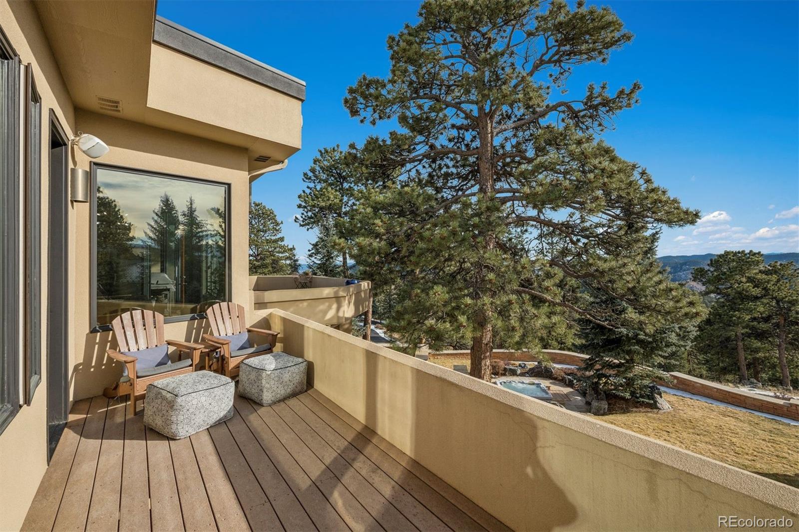 23534 Waynes Way Golden, CO 80401 - Photo 19 of 50 a view of balcony with furniture and garden