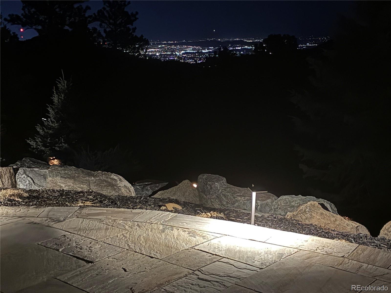 23534 Waynes Way Golden, CO 80401 - Photo 2 of 50 a wooden bench sitting in the middle of a house