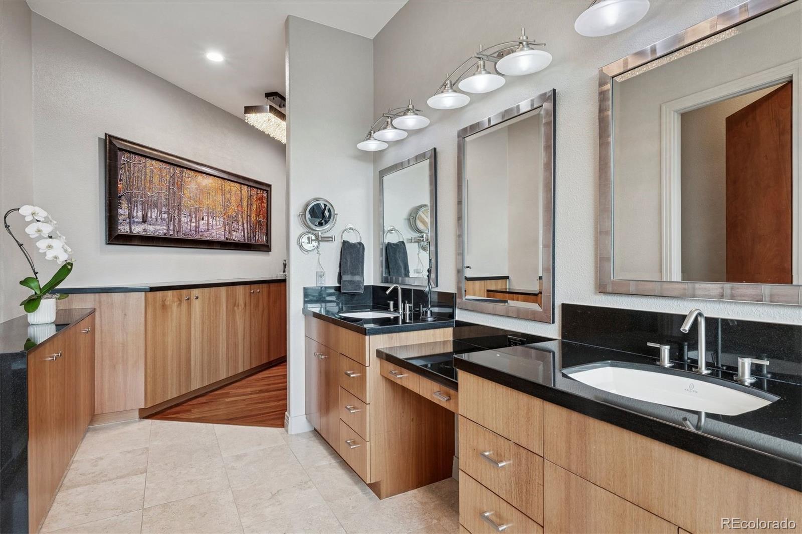 23534 Waynes Way Golden, CO 80401 - Photo 24 of 50 a kitchen with stainless steel appliances a sink stove and cabinets