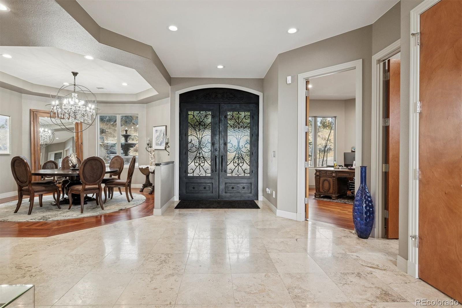 23534 Waynes Way Golden, CO 80401 - Photo 35 of 50 an entryway and livingroom with furniture
