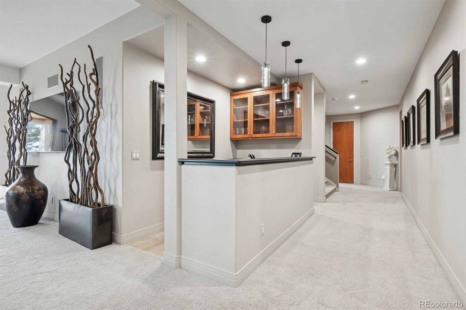 23534 Waynes Way Golden, CO 80401 - Photo 39 of 50 a view of a kitchen with a refrigerator and a sink
