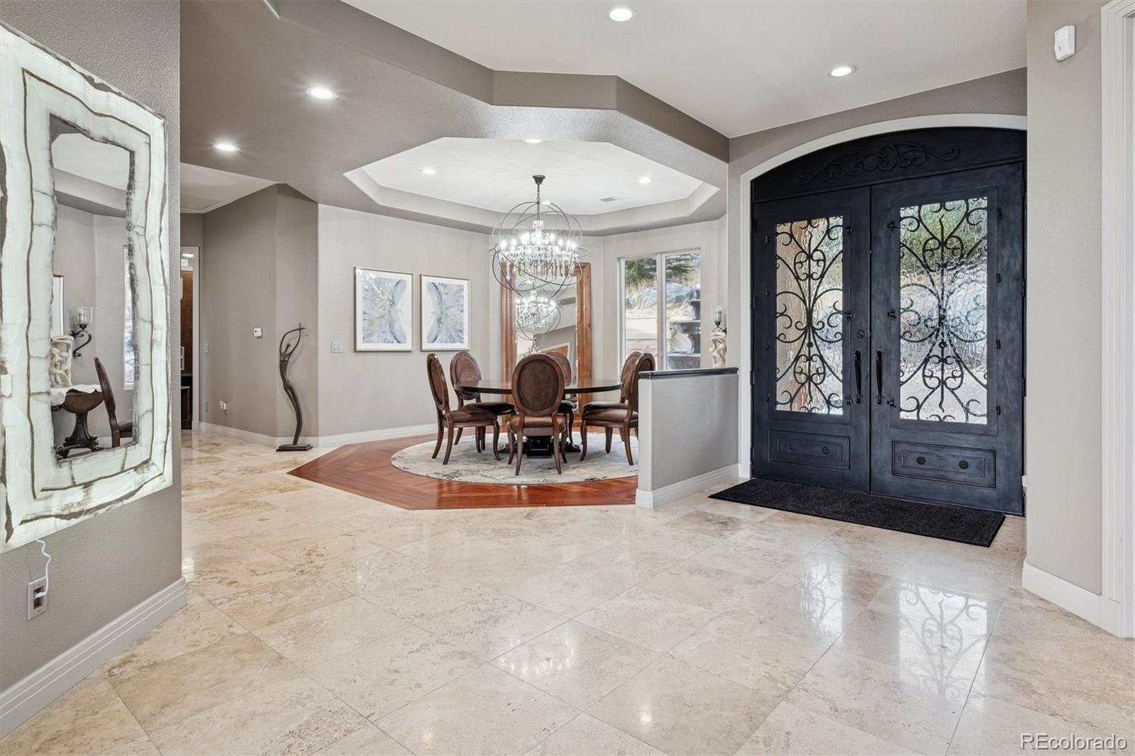 23534 Waynes Way Golden, CO 80401 - Photo 8 of 50 an open kitchen with granite countertop a stove and large cabinets