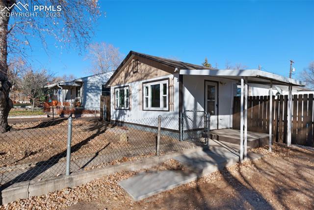 1007 Sunset Road Colorado Springs, CO 80909 - Photo 2 of 20 Covered front entry.