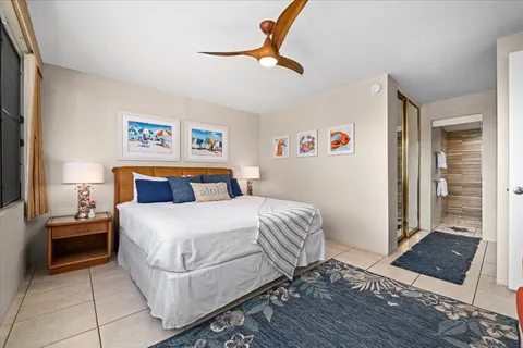 a bathroom with a double vanity sink toilet and shower