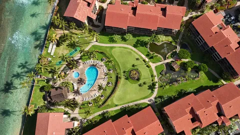 a living room with furniture and a lamp