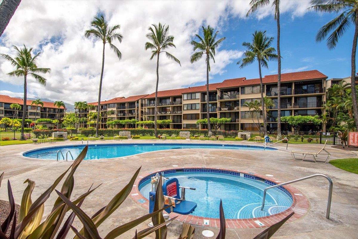 3543 Lower Honoapiilani Road, Unit J302 Lahaina, HI 96761 - Photo 36 of 44 a view of swimming pool with outdoor seating and a patio