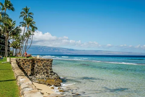 a view of swimming pool outdoor seating and water