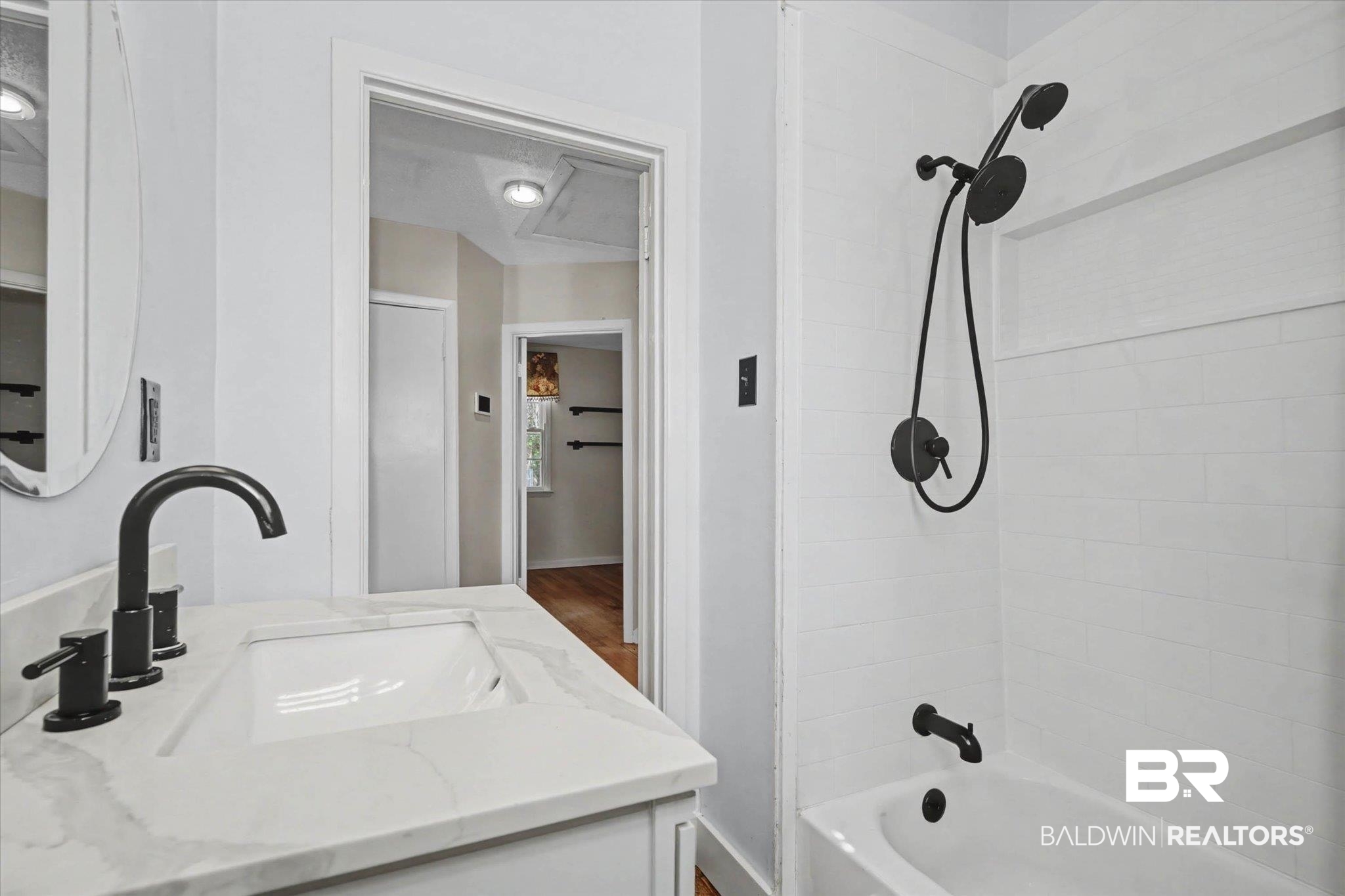 5117 Norton Lane Mobile, AL 36608 - Photo 17 of 35 Full bathroom featuring vanity and shower / washtub combination