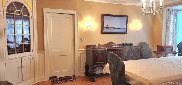 a view of a workspace with furniture