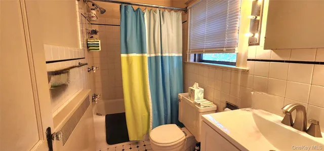 a view of a livingroom with furniture and staircase