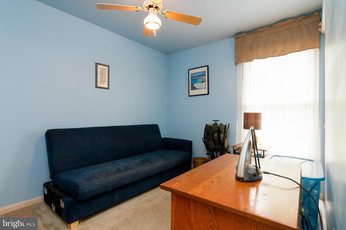 18310 Cattail Road Poolesville, MD 20837 - Photo 13 of 24 a living room with furniture and a window