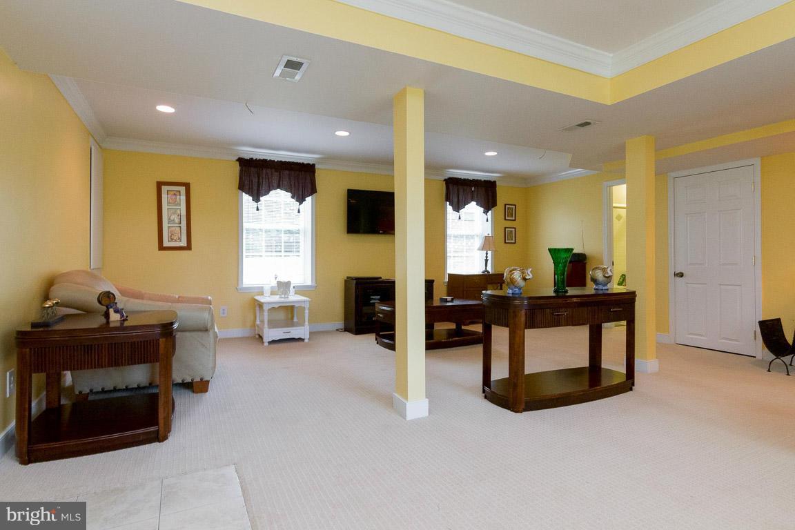 18310 Cattail Road Poolesville, MD 20837 - Photo 14 of 24 a view of a lobby with furniture
