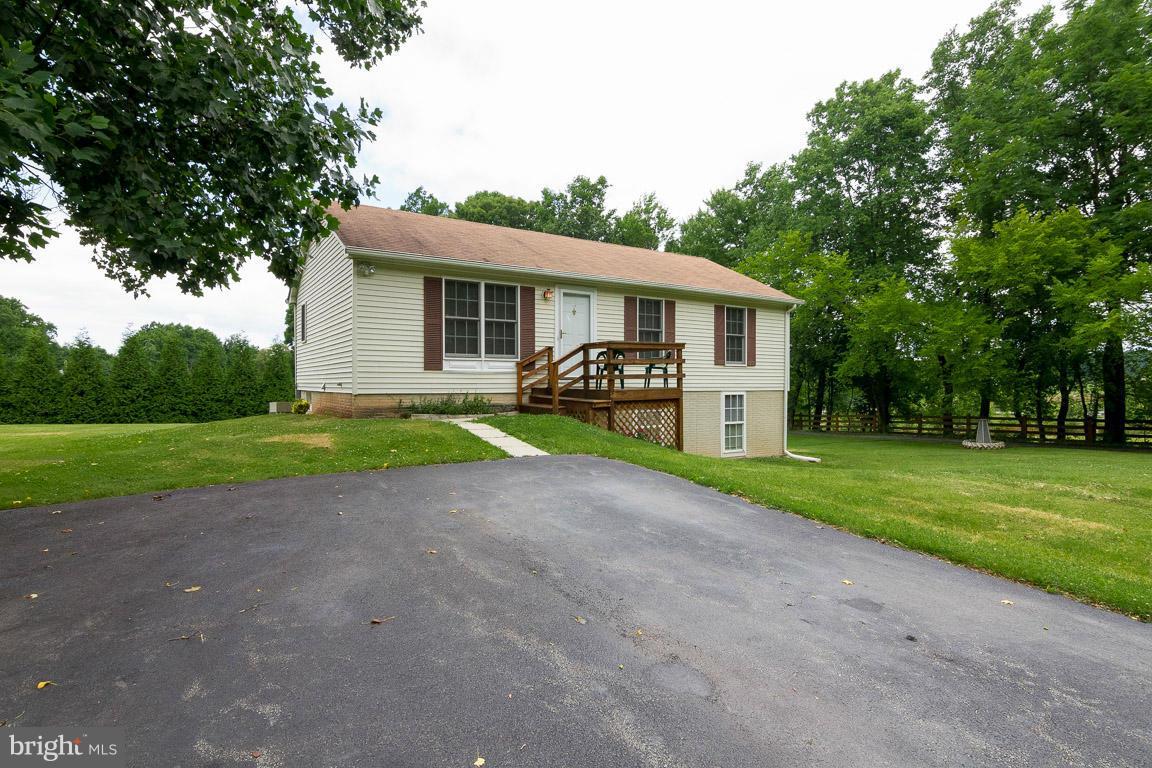 18310 Cattail Road Poolesville, MD 20837 - Photo 23 of 24 a view of a house with a yard