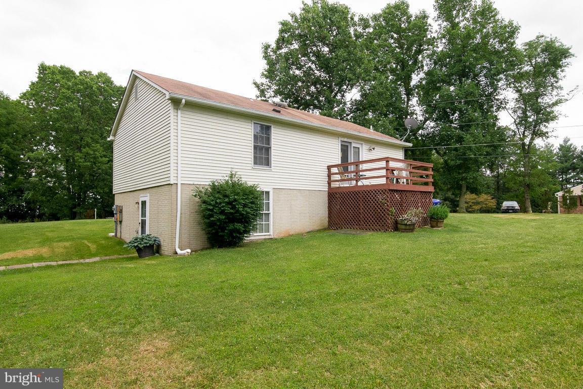 18310 Cattail Road Poolesville, MD 20837 - Photo 24 of 24 a view of a backyard with a garden