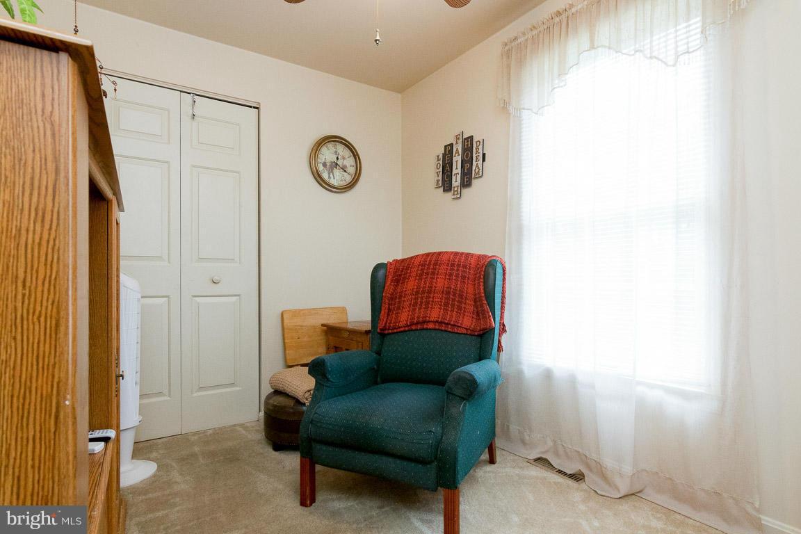 18310 Cattail Road Poolesville, MD 20837 - Photo 9 of 24 a living room with furniture and a window