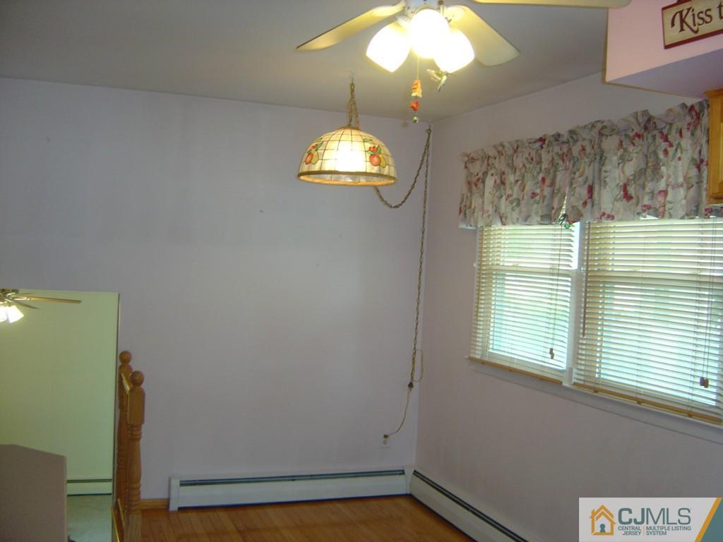 69 Greenbrook Road Middlesex, NJ 08846 - Photo 5 of 24 a view of a decorative light in a room