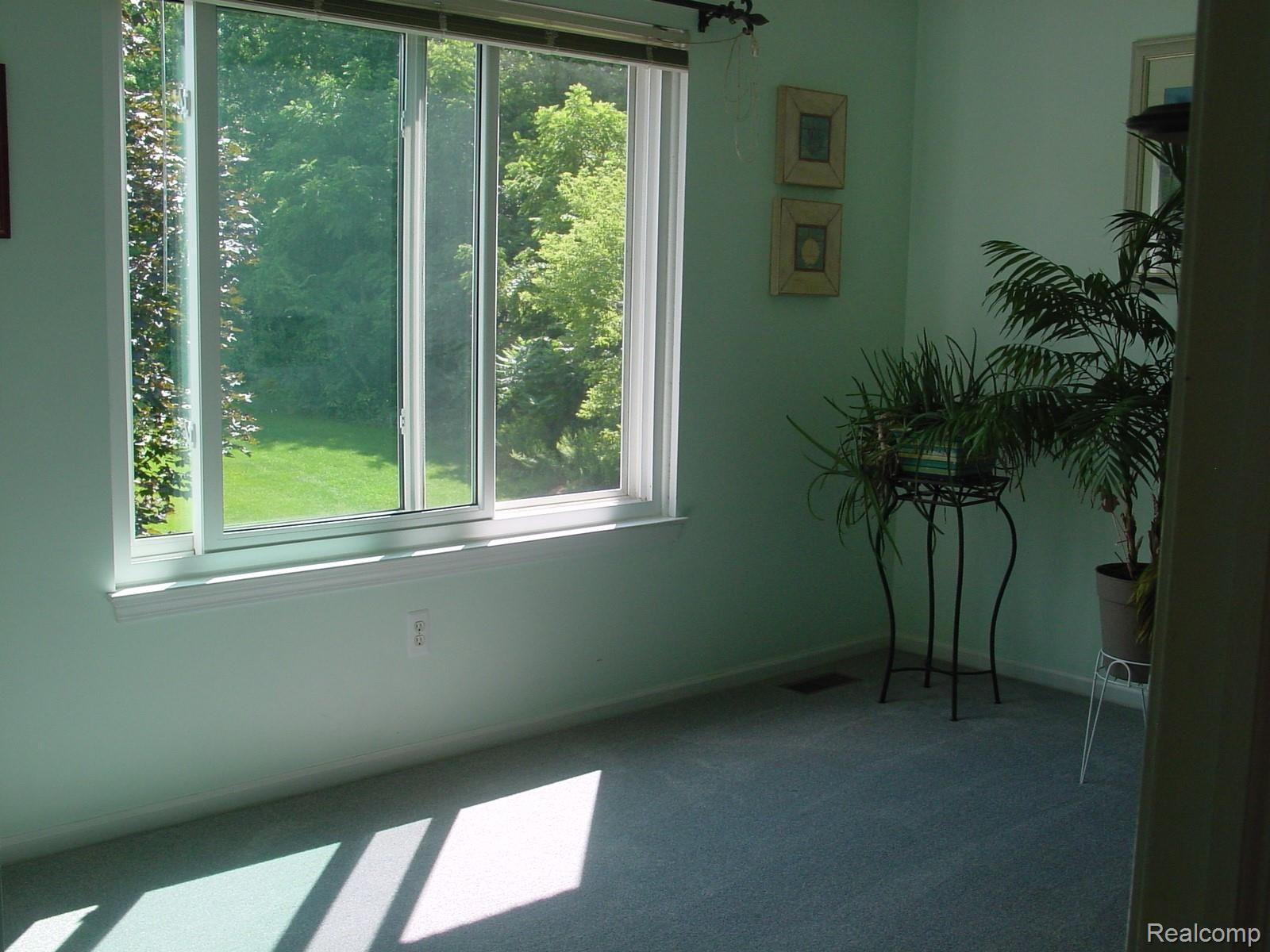 130 Chestnut Ridge Walled Lake, MI 48390 - Photo 30 of 32 spare room.JPG
