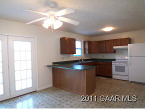 3453 Cold Springs Road Greenville, VA 24440 - Photo 3 of 7 a kitchen with kitchen island granite countertop a sink cabinets and stainless steel appliances