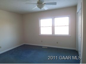 3453 Cold Springs Road Greenville, VA 24440 - Photo 6 of 7 an empty room with window and ceiling fan