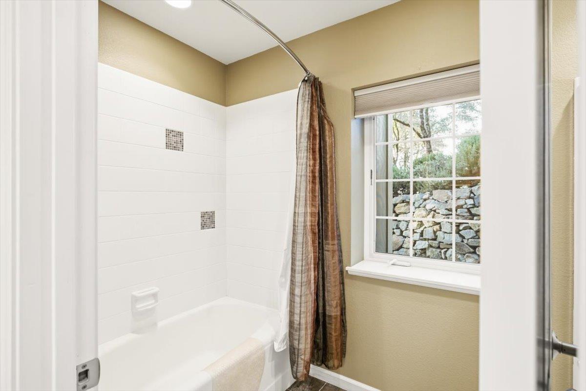12531 Lowhills Road Nevada City, CA 95959 - Photo 56 of 92 a bathroom with a bathtub and shower