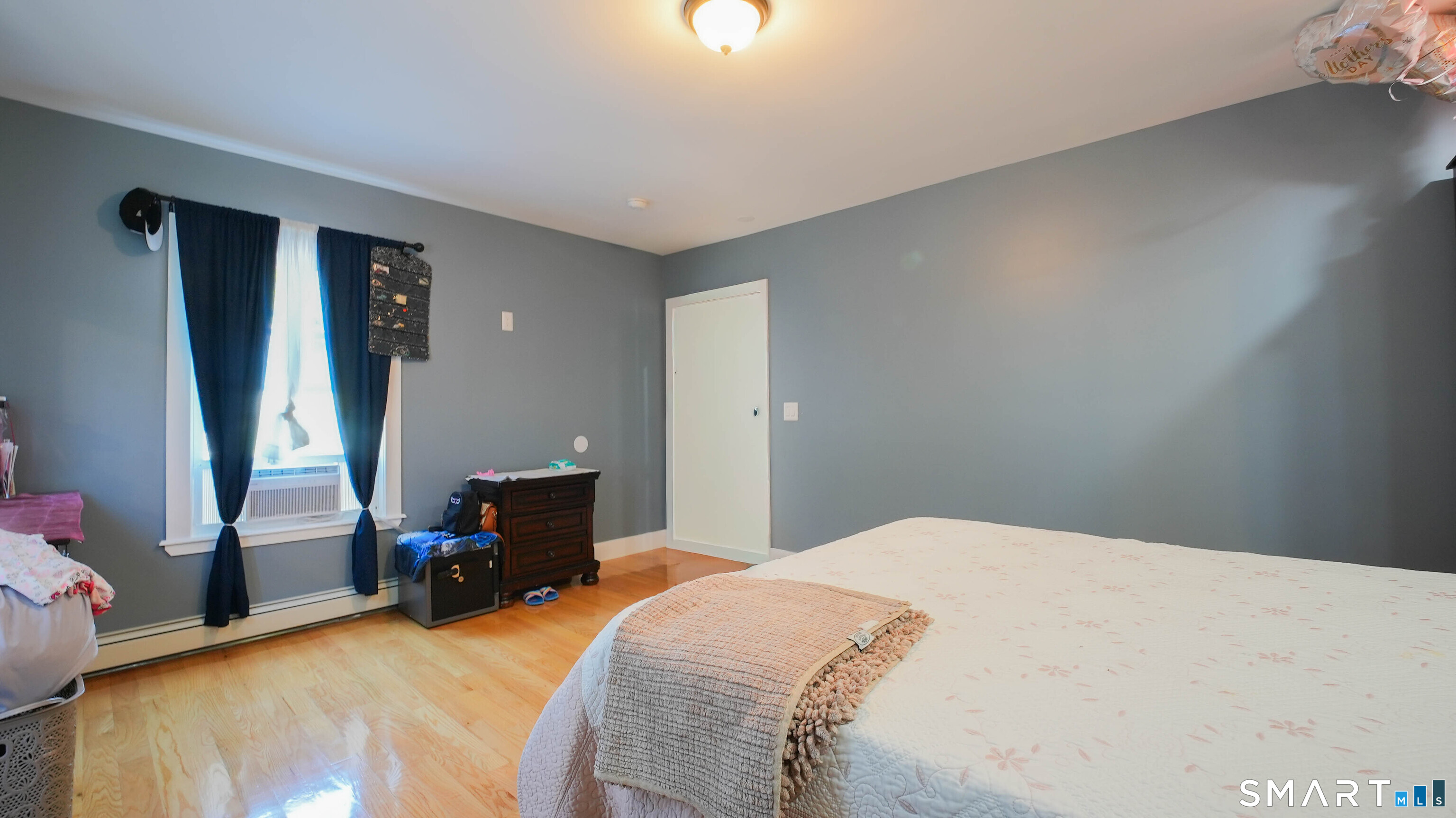 849 Frost Road Waterbury, CT 06705 - Photo 11 of 36 a bedroom with a bed and furniture