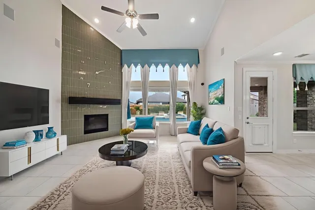 a view of a kitchen with a sink and a refrigerator