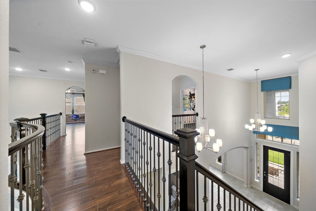 3810 Everly Bend Drive Spring, TX 77386 - Photo 20 of 40 a view of a hallway with furniture and wooden floor