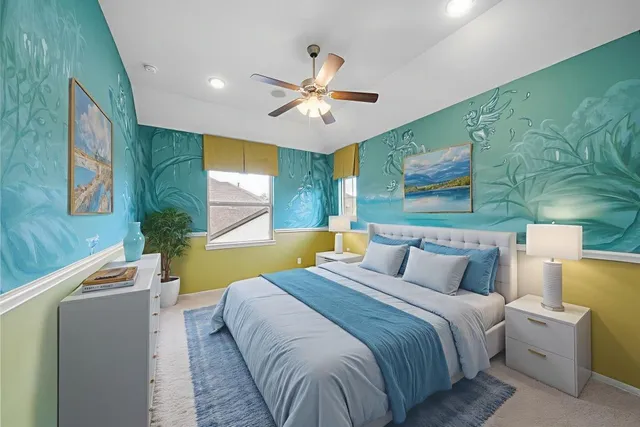 a view of an entryway with wooden floor and windows