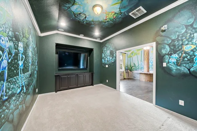 a view of a hallway with furniture and a chandelier