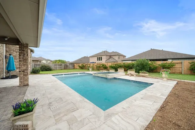 a view of a porch with seating space
