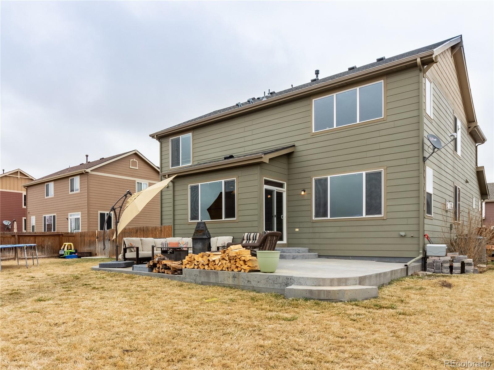 8639 Raspberry Drive Frederick, CO 80504 - Photo 29 of 30 a view of a house with a patio