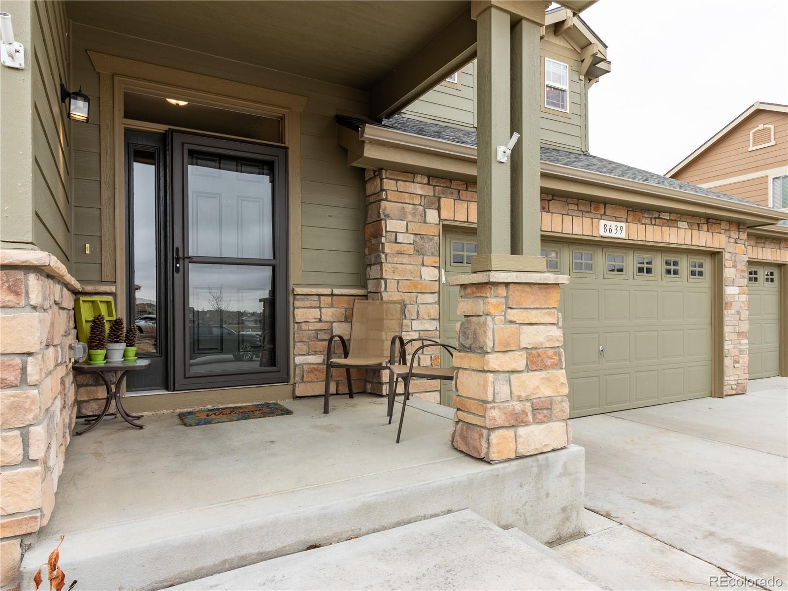 8639 Raspberry Drive Frederick, CO 80504 - Photo 5 of 30 a view of a brick house with outdoor seating space