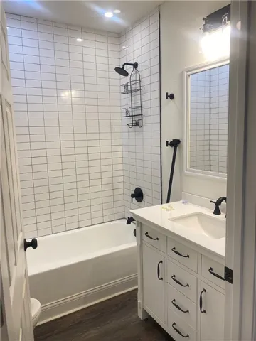 a bathroom with a sink and a bathtub
