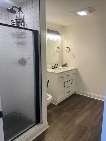 a view of a bathroom with shower