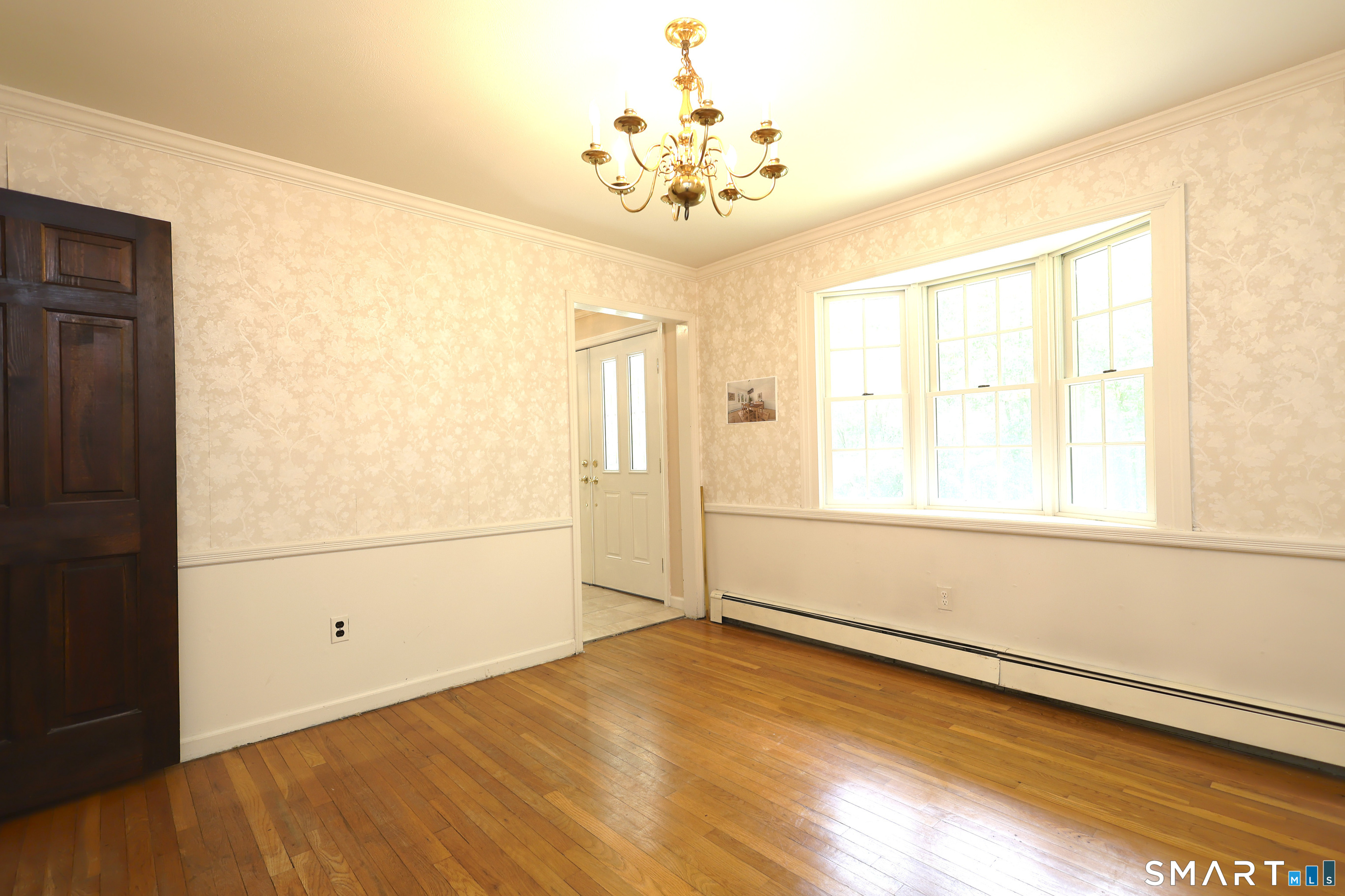 145 Wilton Road East Ridgefield, CT 06877 - Photo 9 of 37 Dining room with hardwood floors.