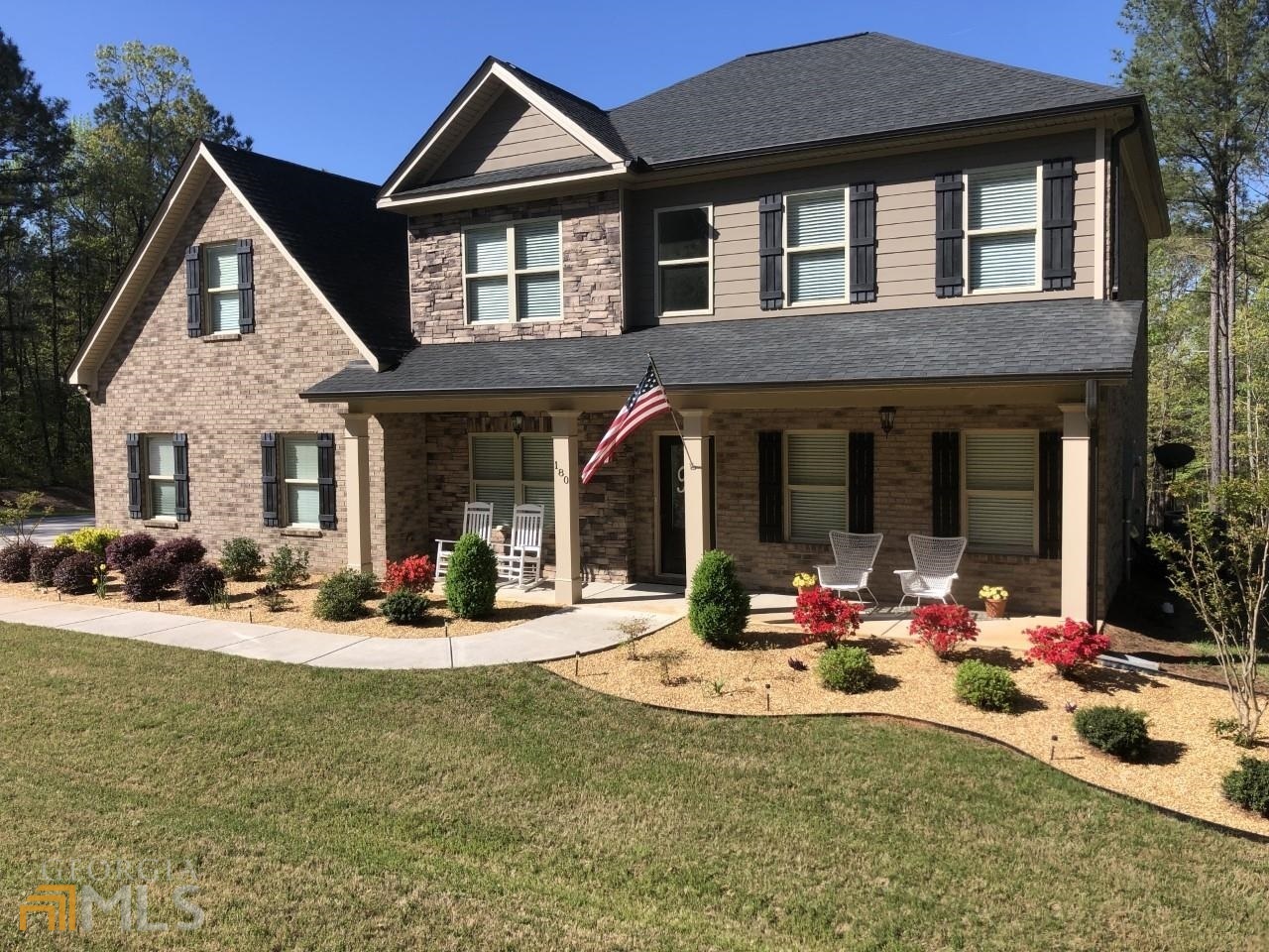 a view of the house with outdoor seating space
