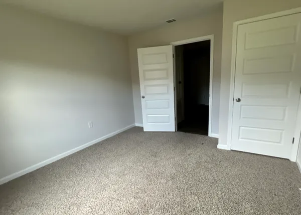 an empty room with closet
