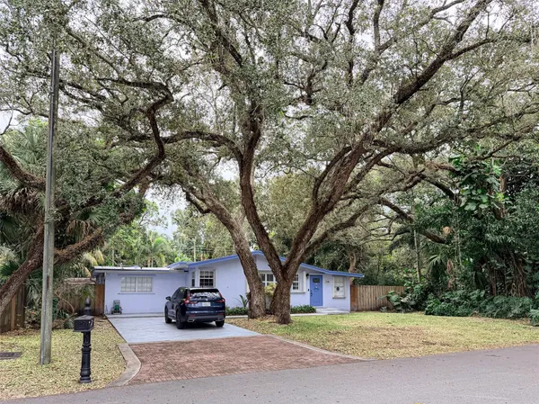 a car parked in front of a house