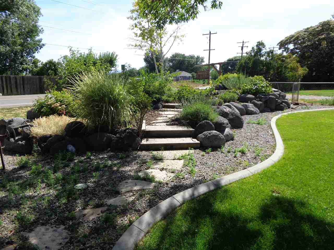 3628 G Road Palisade, CO 81526 - Photo 3 of 24 a view of a garden with large tree