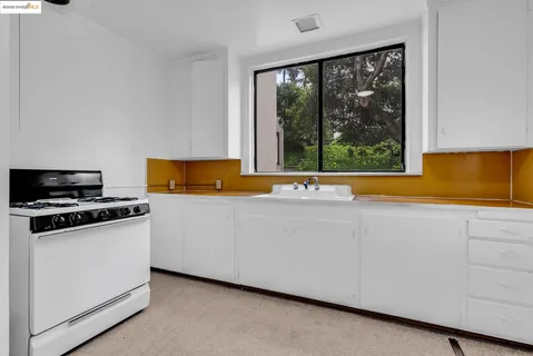 a view of kitchen and utility room