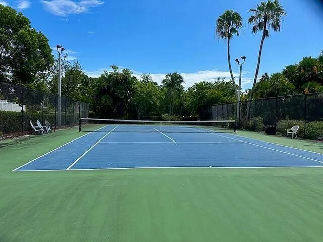 a kitchen with appliances cabinets and a sink