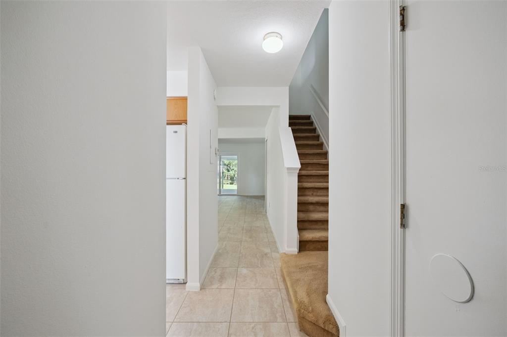 498 Green Spring Circle Winter Springs, FL 32708 - Photo 3 of 20 a view of a hallway with entryway