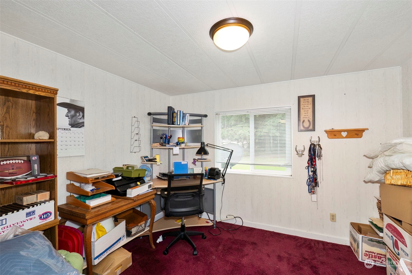 7344 191st Avenue Southwest Rochester, WA 98579 - Photo 16 of 39 a view of a workspace with furniture and a window