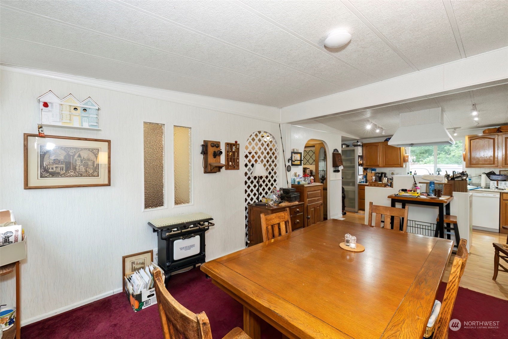 7344 191st Avenue Southwest Rochester, WA 98579 - Photo 8 of 39 a view of a dining room with furniture