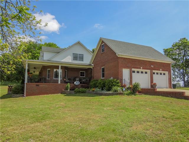 341 Johnson Branch Road Pulaski, TN 38478 - Photo 3 of 20 Corner of home showing garage